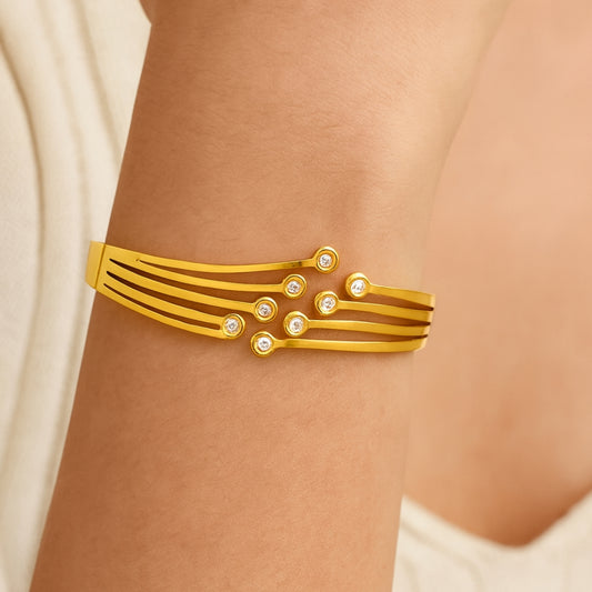 Elegant Orbit Gold Bracelet